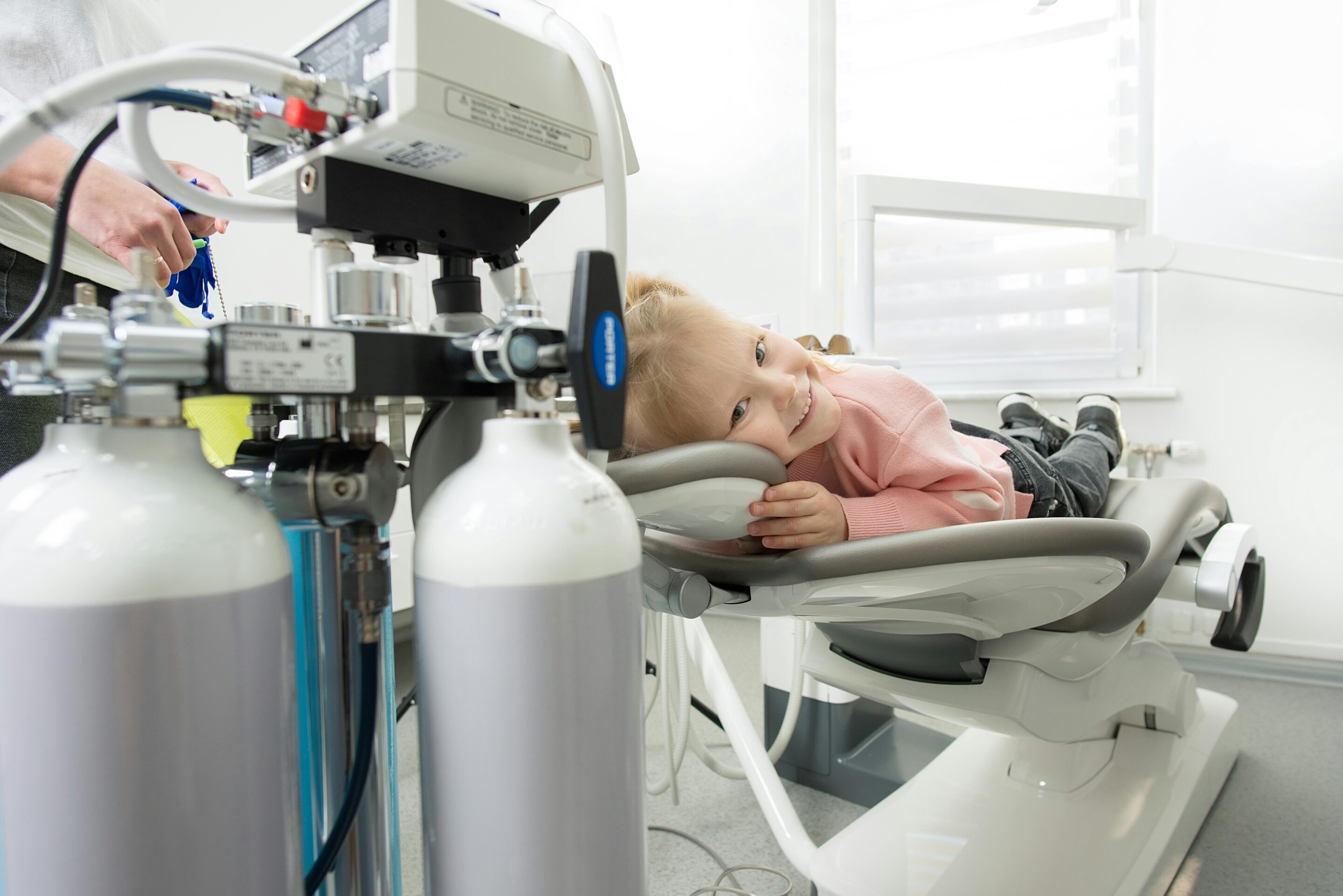 Young child smiling during a pediatric dental visit