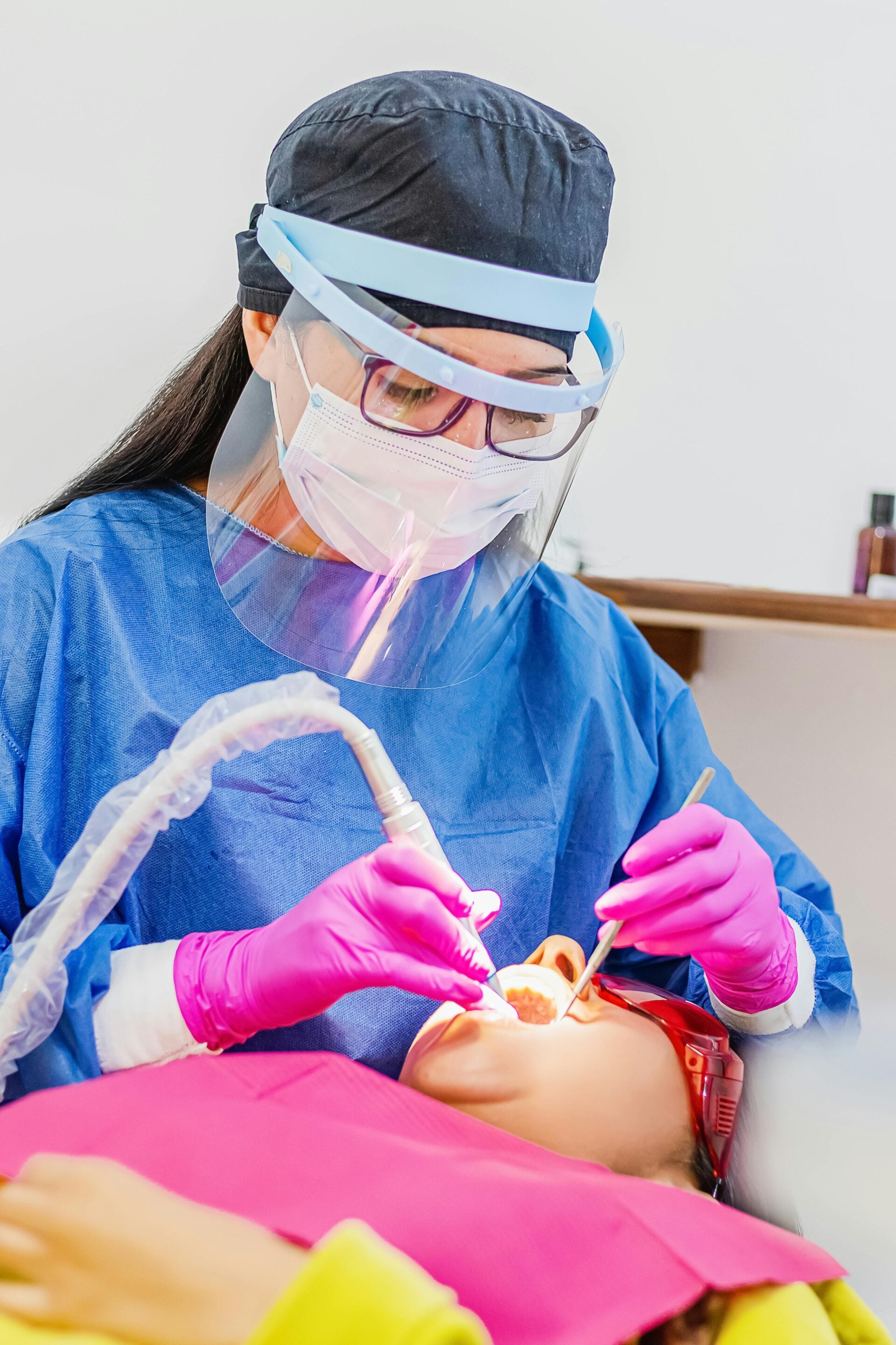 Dentist performing a dental procedure